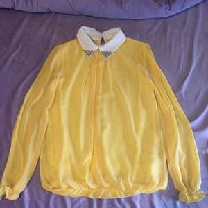 yellow blouse w/ white collar